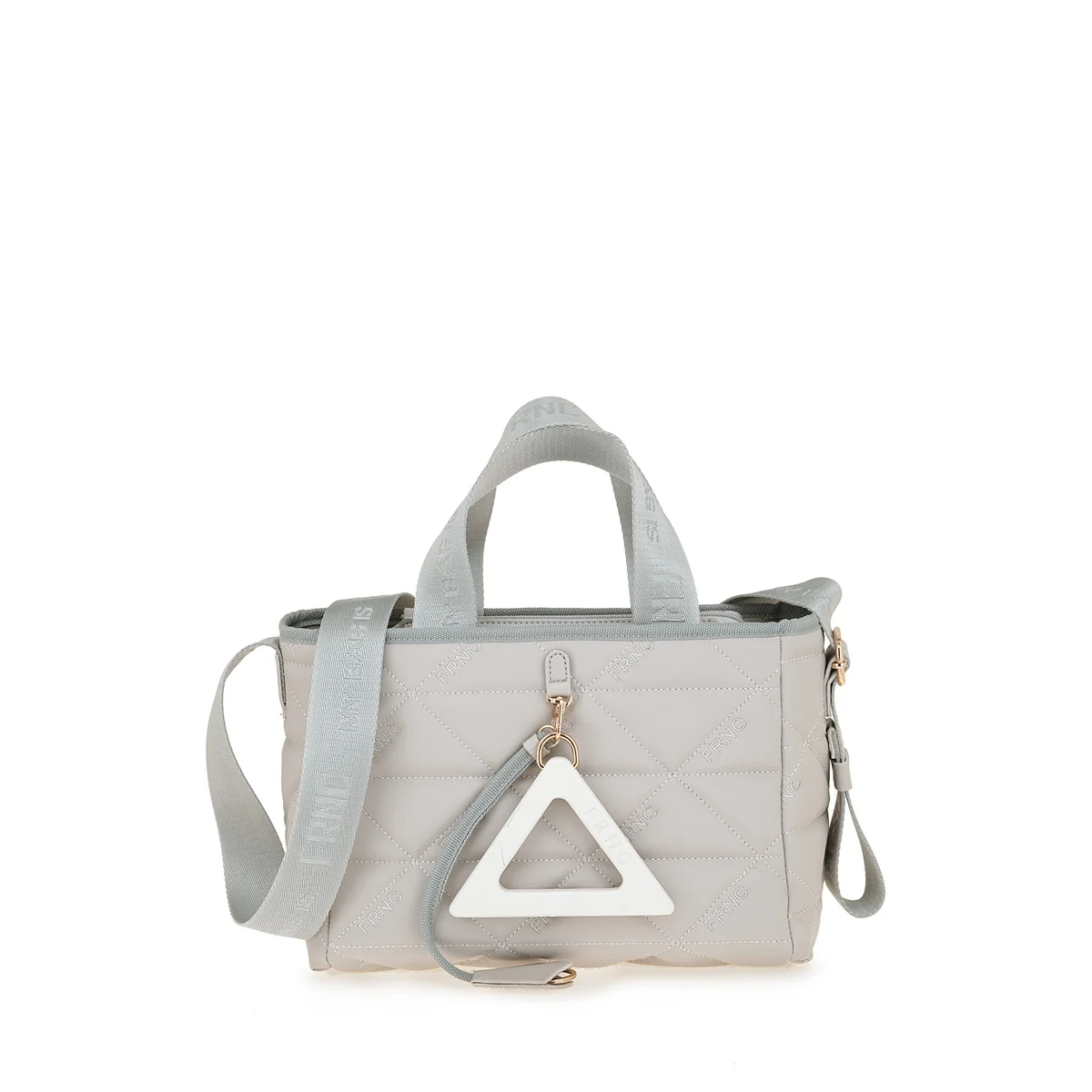 Small light-gray quilted handbag with top handles, a detachable shoulder strap, and a white triangular pendant charm on the front.